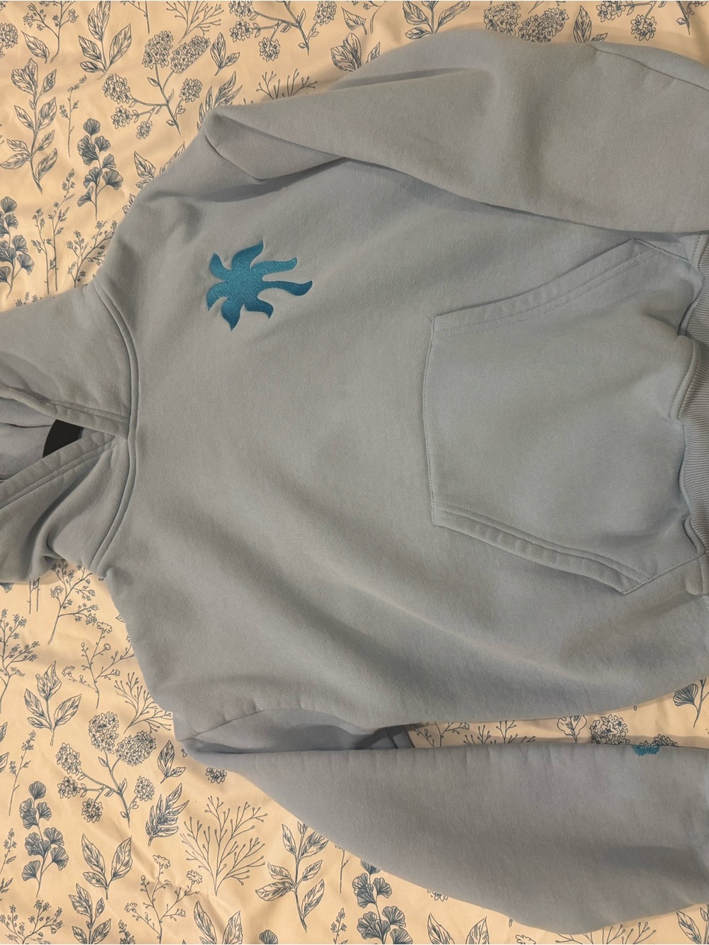 Pink Palm Puff Light Blue Pullover Hoodie with Teal Embroidered Motif
